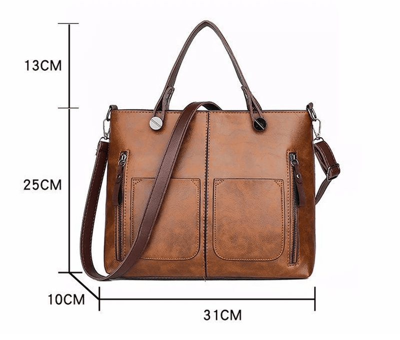 Brown Leather Handbag With Adjustable Strap And Multiple Pockets