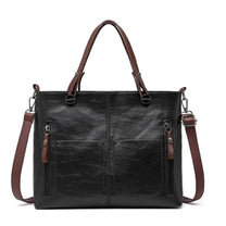 Brown Leather Handbag With Adjustable Strap And Multiple Pockets