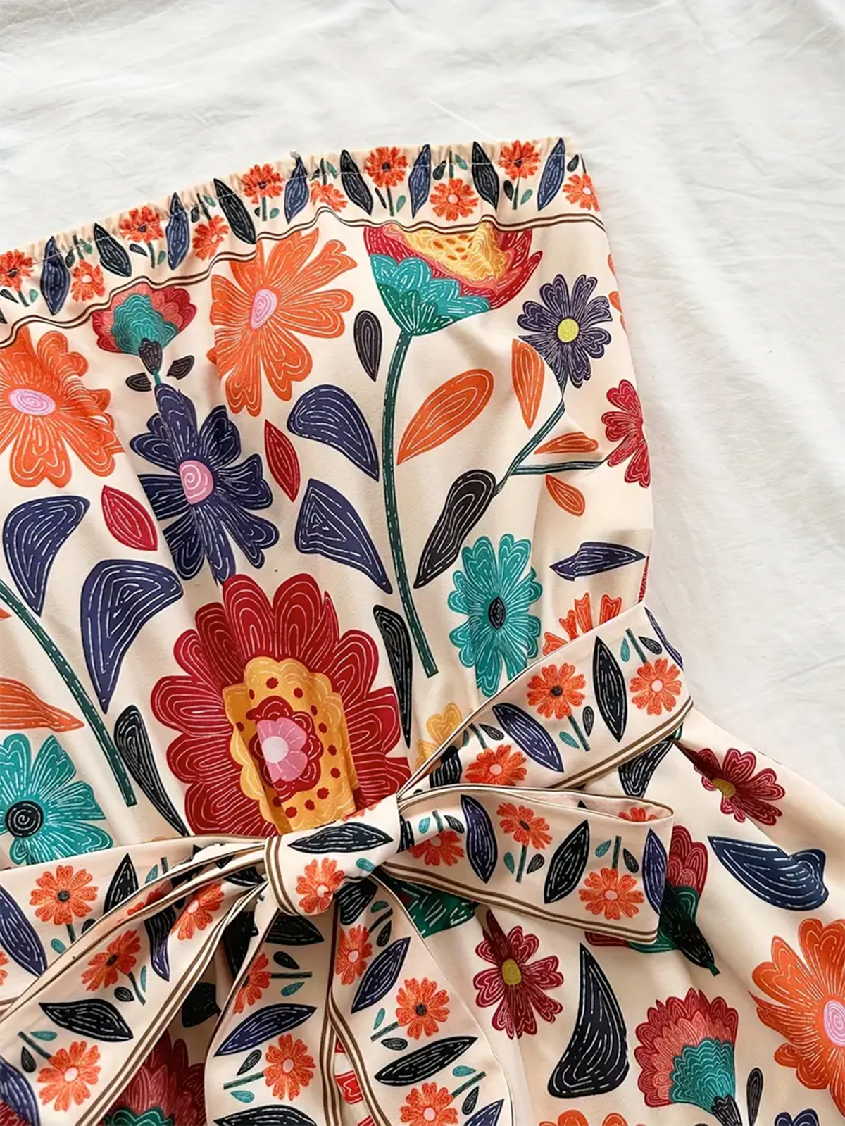 Floral Sleeveless Jumpsuit with Waist Tie