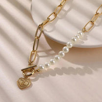 Gold tone Pearl-Embellished Crossed Heart Pendant