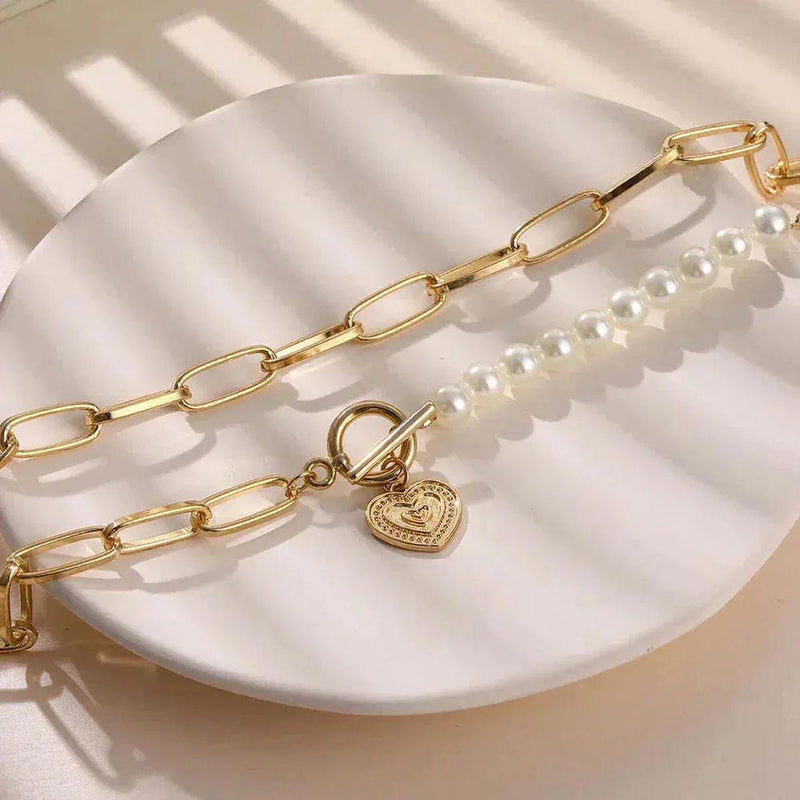 Gold tone Pearl-Embellished Crossed Heart Pendant