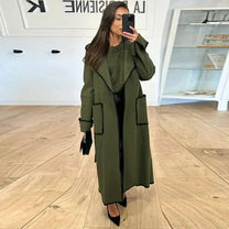 Long Women&#39;s Coat With Contrast Stitching And Lapel Collar