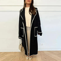 Long Women&#39;s Coat With Contrast Stitching And Lapel Collar