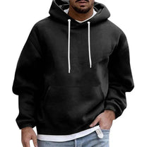 Oversized Hoodie With Kangaroo Pocket And Adjustable Hood