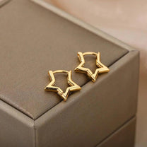 Sleek Gold Tone Star Studs