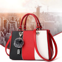 Women&#39;s Handbag With Hairball Embellishments And Patchwork Design