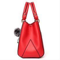 Women&#39;s Handbag With Hairball Embellishments And Patchwork Design