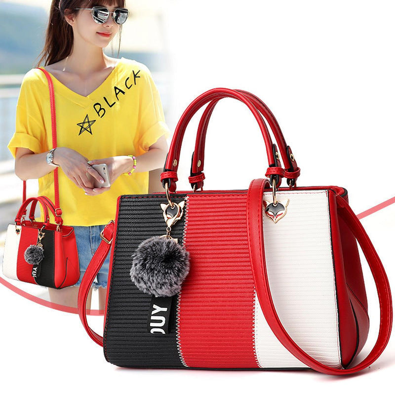 Women&#39;s Handbag With Hairball Embellishments And Patchwork Design