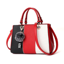 Women&#39;s Handbag With Hairball Embellishments And Patchwork Design