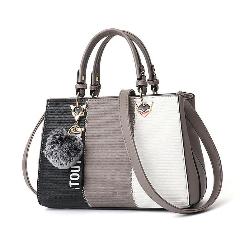 Women&#39;s Handbag With Hairball Embellishments And Patchwork Design