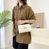 Women&#39;s Modern Handbag With Adjustable Strap And Multiple Pockets