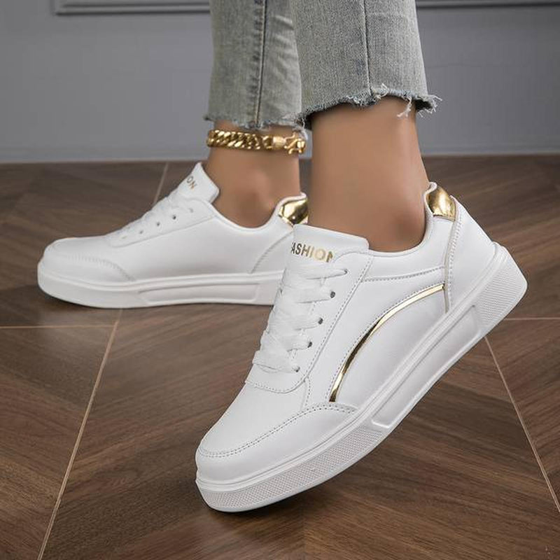 Women&#39;s White Leather Sneakers With Metallic Accents