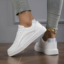 Women&#39;s White Leather Sneakers With Metallic Accents
