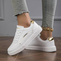 Women&#39;s White Leather Sneakers With Metallic Accents